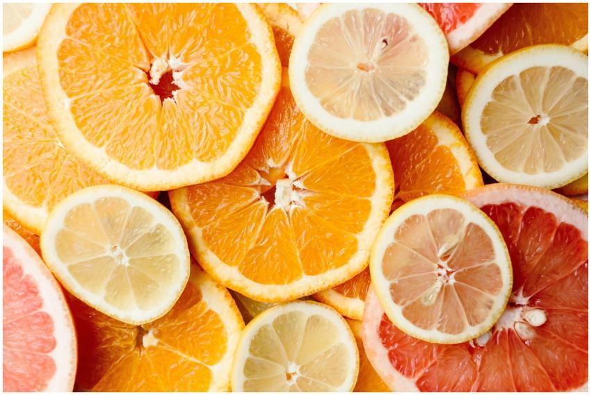 Close-up of fresh, sliced citrus fruits showcasing