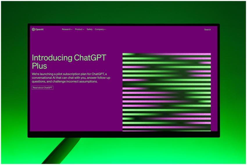 Close-up of a monitor displaying ChatGPT Plus intr