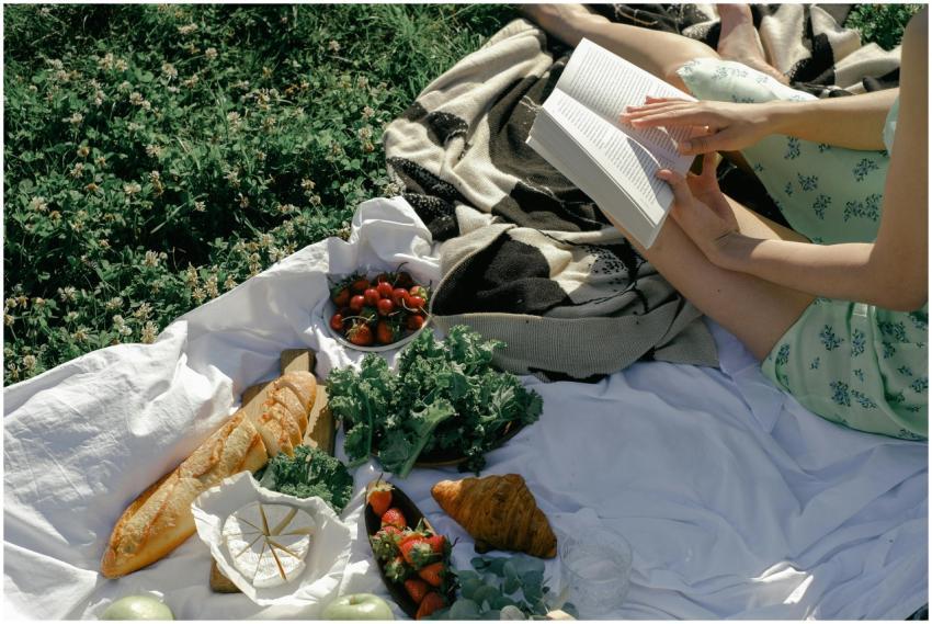 Woman enjoying a relaxing summer picnic with fresh