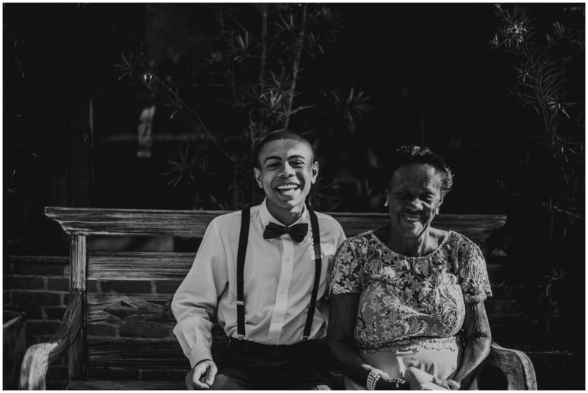 A joyful black and white portrait of a happy elder
