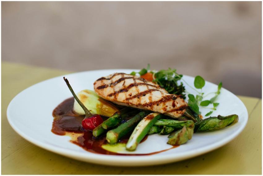 Savor a delicious grilled chicken breast paired wi