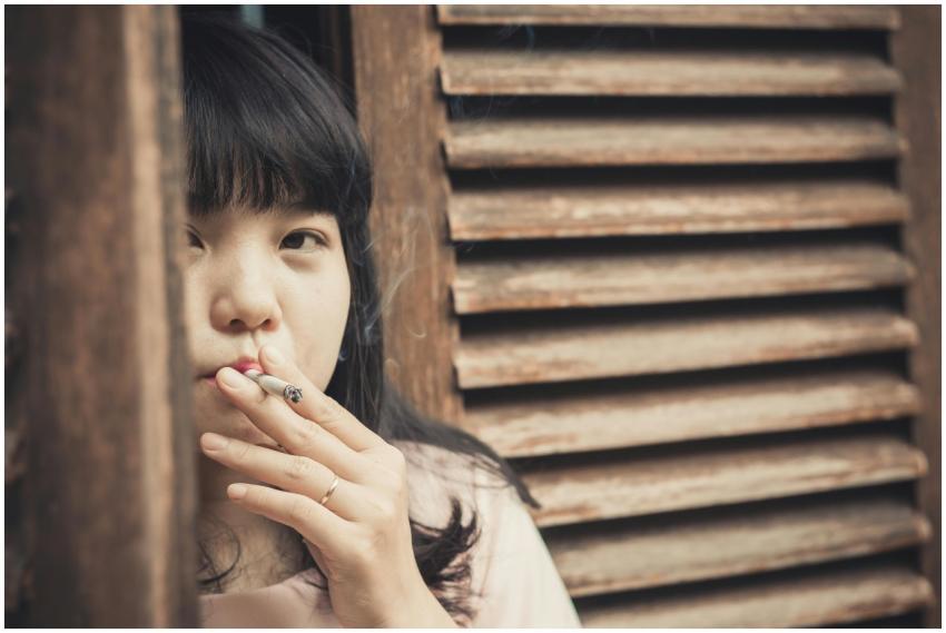 Contemplative Woman Smoking Wooden
