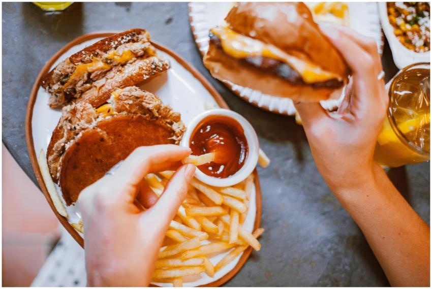 Mouth-watering fast food meal featuring burgers, f
