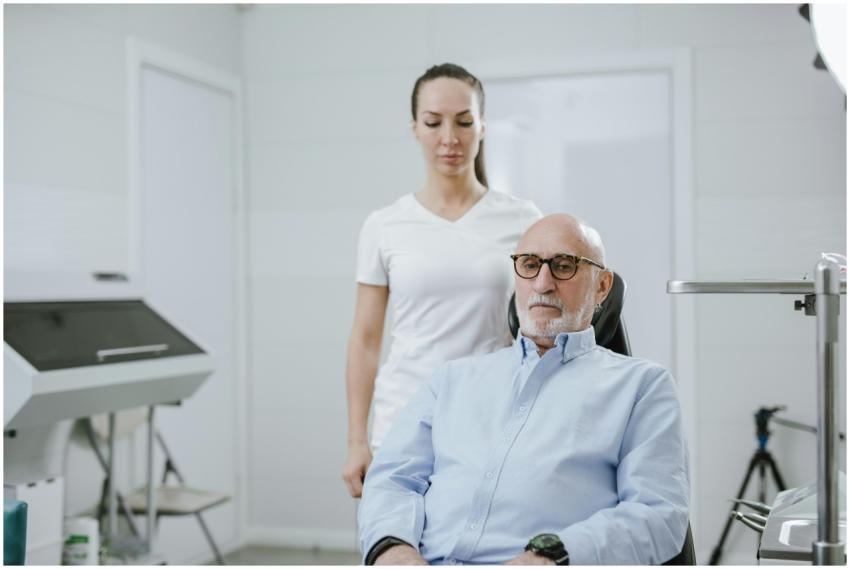 A doctor and senior patient in a modern medical cl