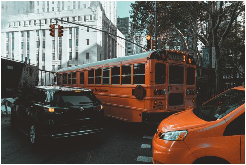 Busy New York City street with traffic including a