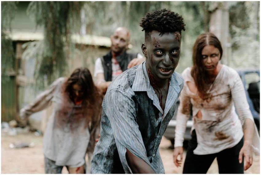 Eerie scene of zombies in a forest, perfect for Ha