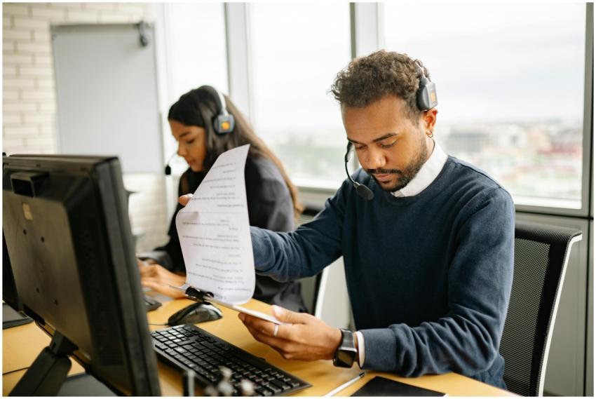 Call center agents with headsets working in a mode