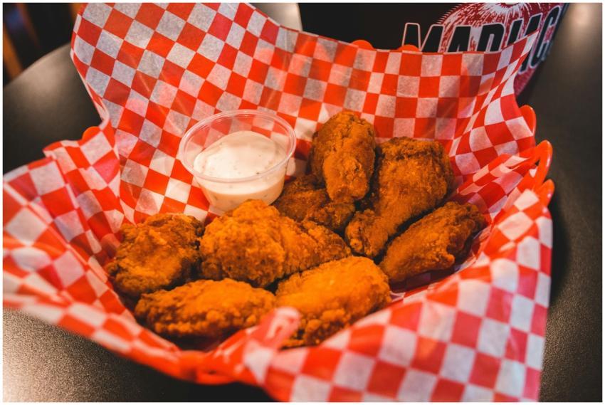 Tasty crispy fried chicken wings served with ranch