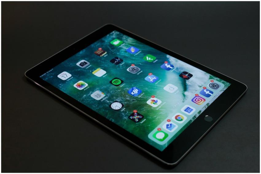 A sleek tablet with various multimedia and social