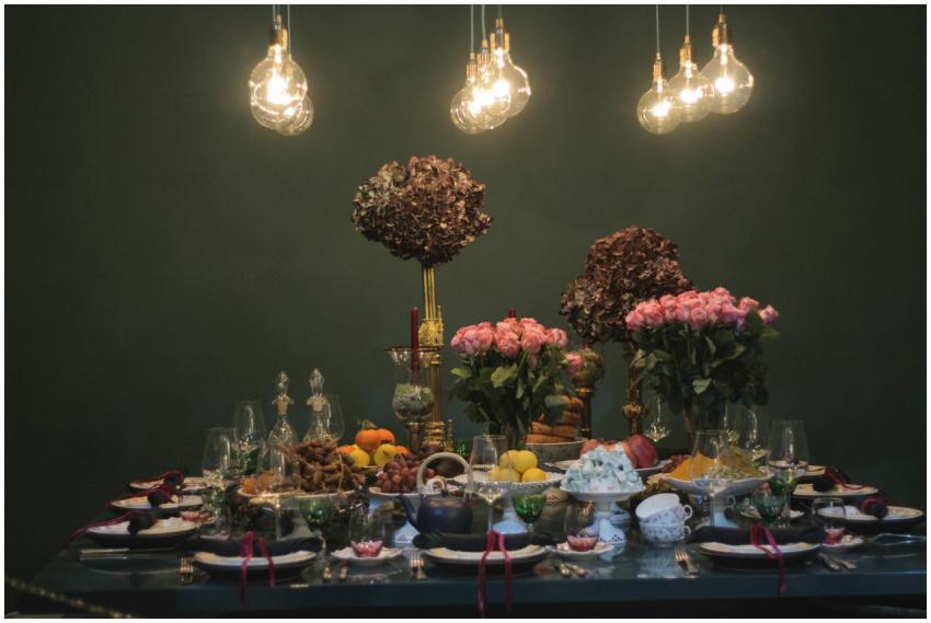 Luxurious dining setting with flowers and ambient