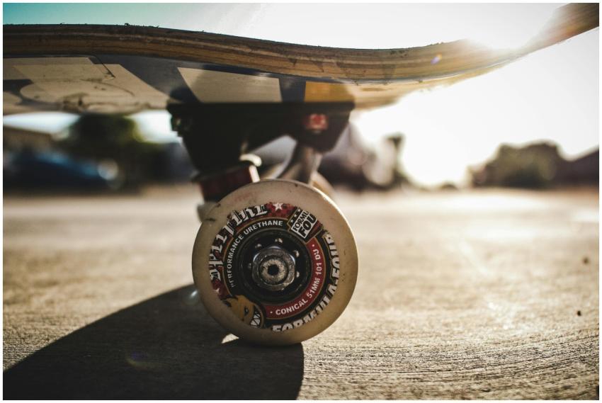 Detailed shot of a skateboard wheel on concrete ou