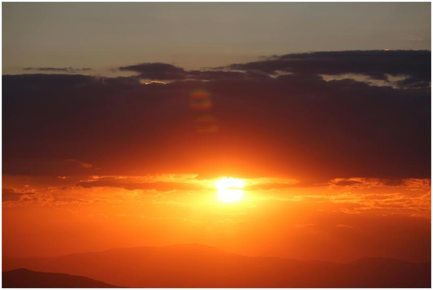 Gorgeous sunset casting vibrant hues over the moun