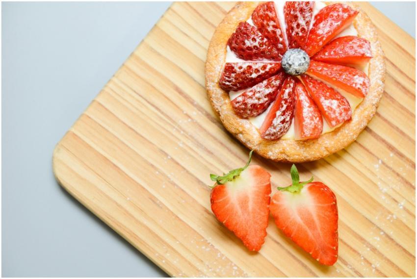 Delicious strawberry tart with fresh berries on a