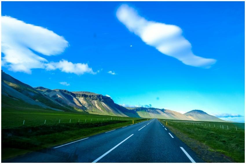 Empty highway through a picturesque landscape with