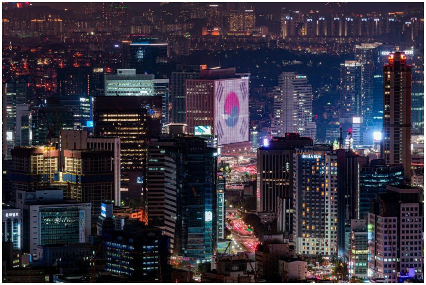 Vibrant night skyline of Seoul featuring illuminat