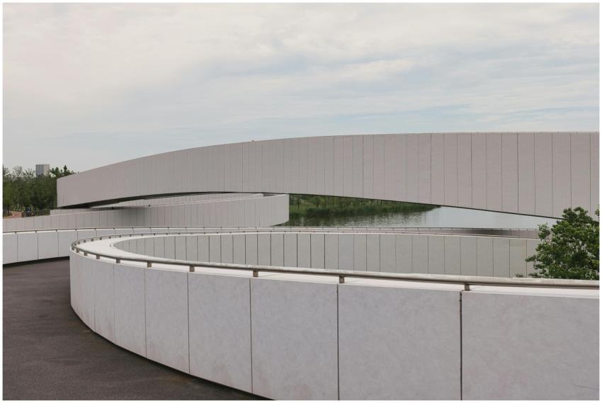 Curved modern footbridge with minimalist design in