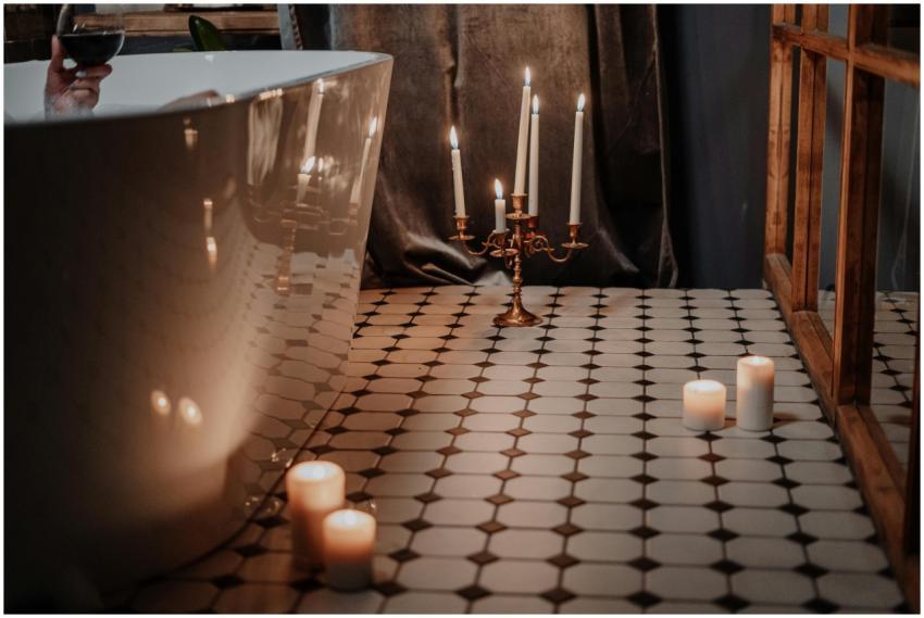 Elegant bathroom scene with candles and a bathtub