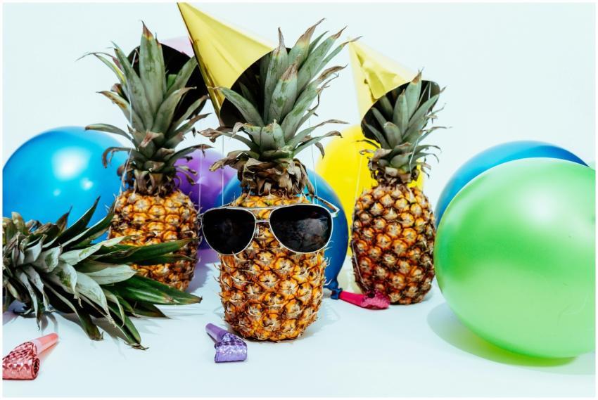 Fun tropical-themed party featuring pineapples wit