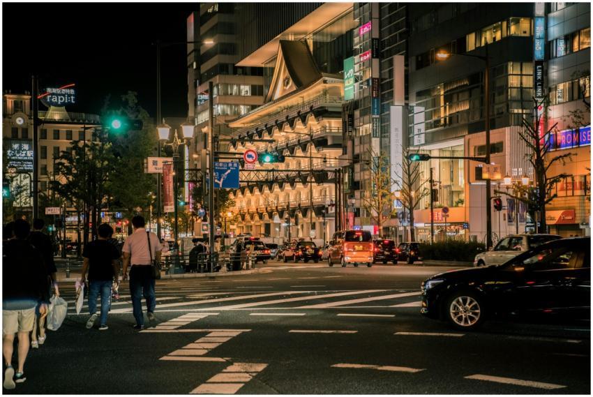 Illuminated cityscape in Osaka, Japan featuring mo