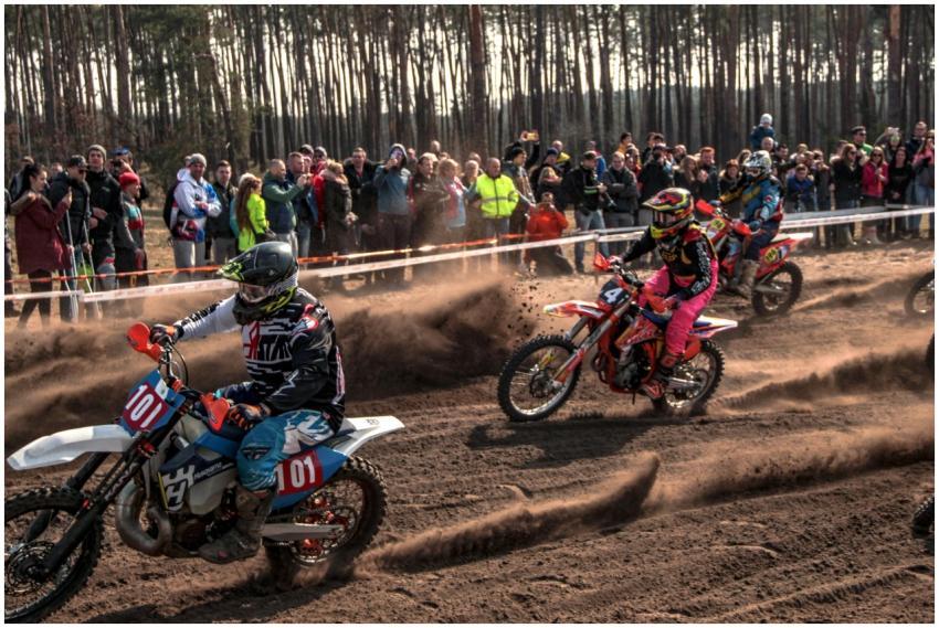 Motocross racers compete in a thrilling outdoor ra