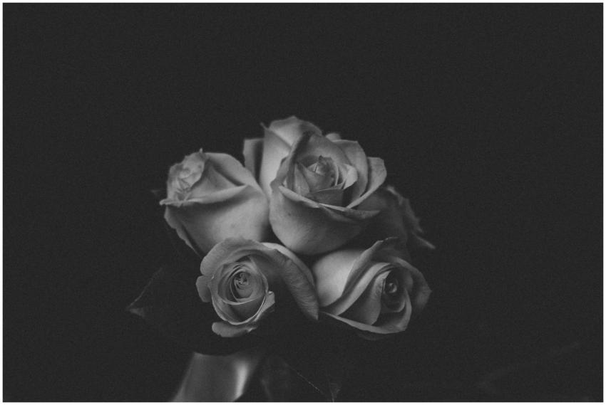 Elegant black and white photo of a rose bouquet wi