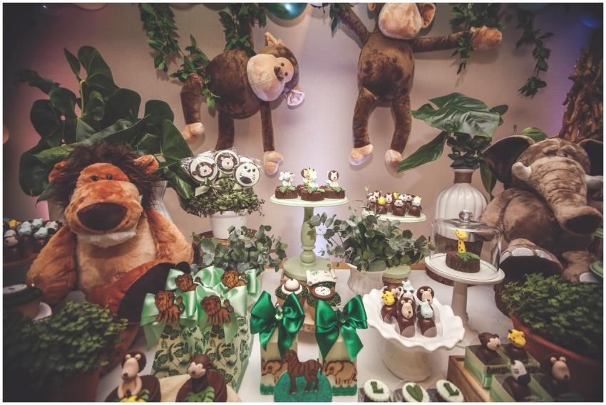 A captivating jungle safari themed dessert table w