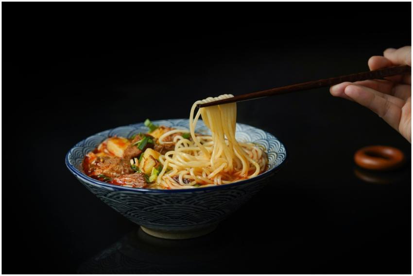 Mouth-watering Asian noodle soup with vegetables a