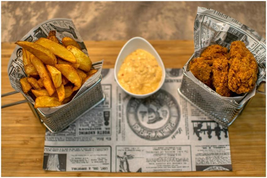 Delicious crispy french fries and fried chicken se
