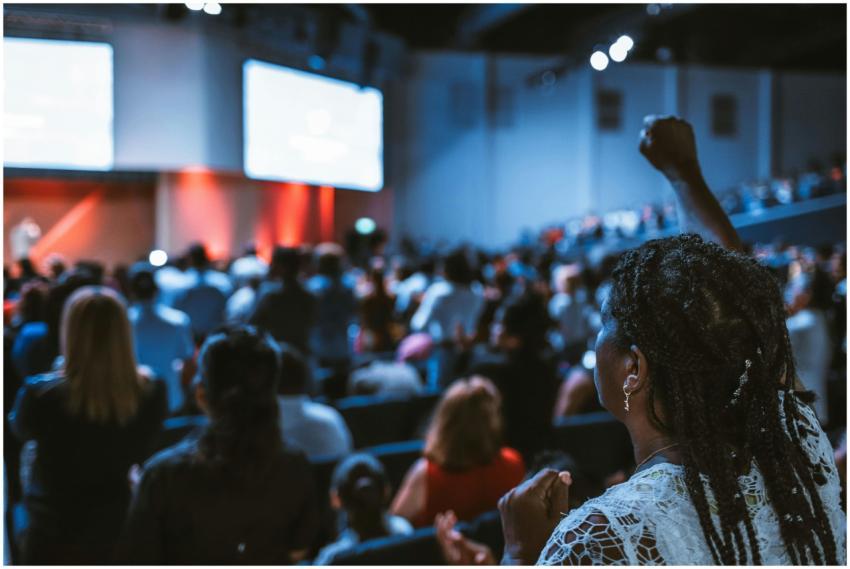 Vibrant crowd at a conference with a focus on an a