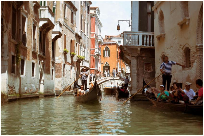 Scenic view of gondolas in Venice's iconic canals,