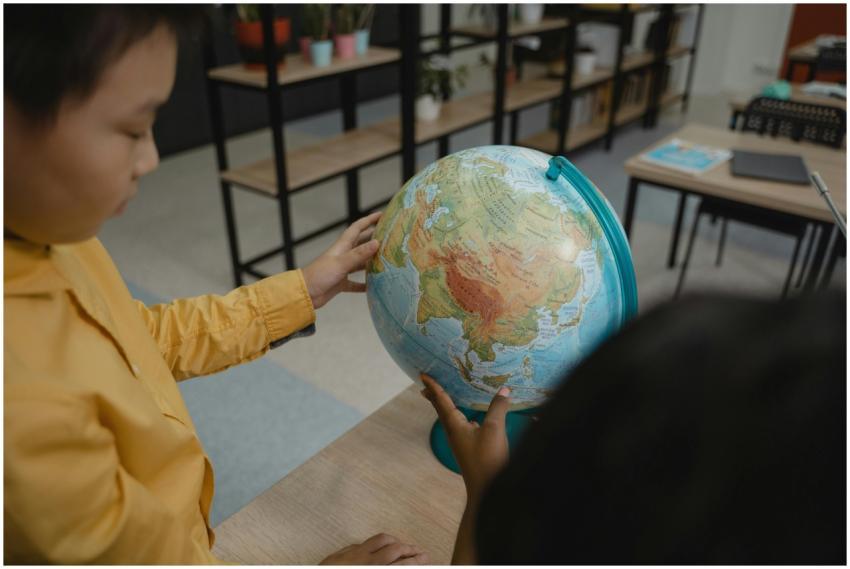 Kids explore a globe in a classroom, highlighting