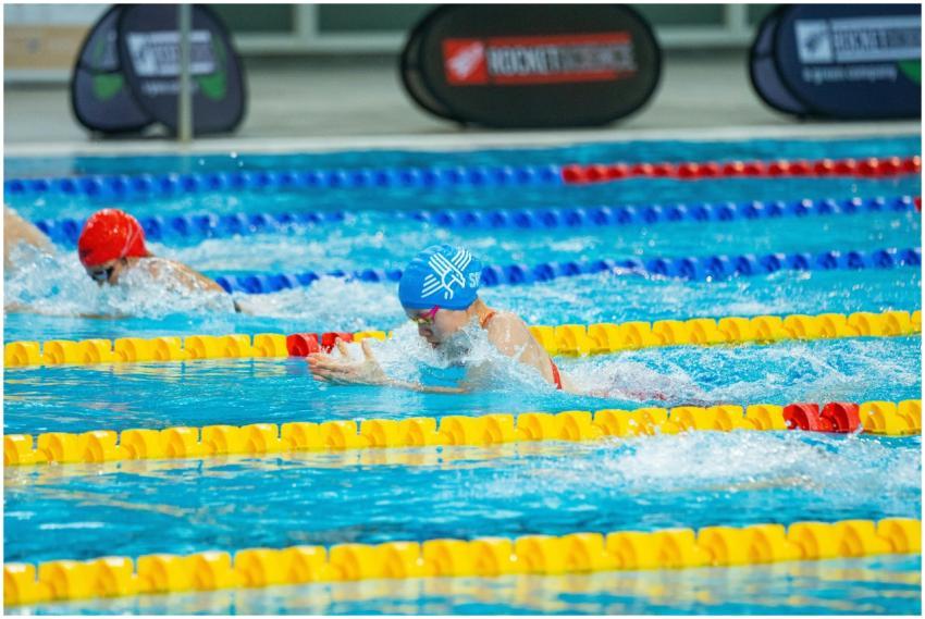 Competitive Swimmers Racing Indoor
