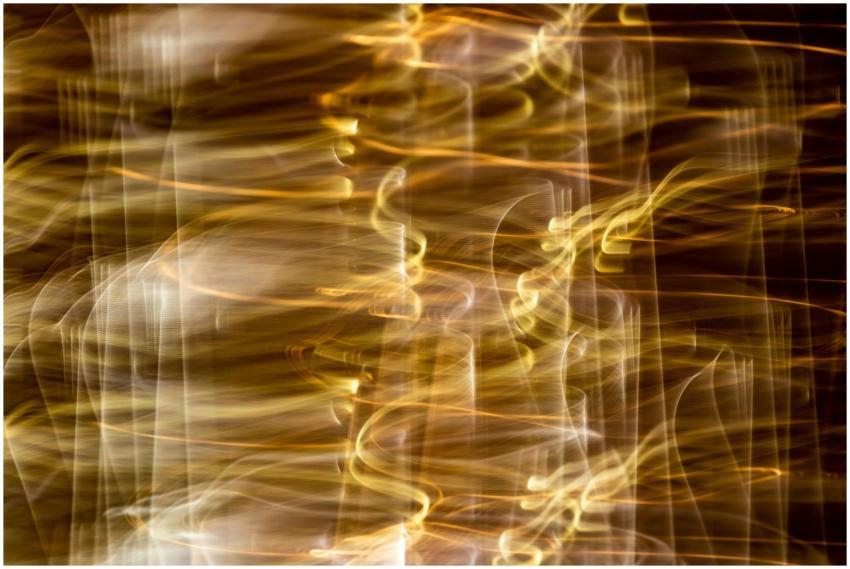 Vibrant abstract image showcasing golden light str