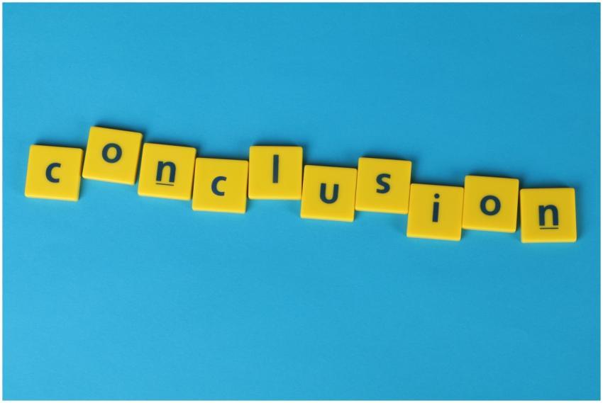 Yellow letter tiles spelling 'conclusion' on a vib