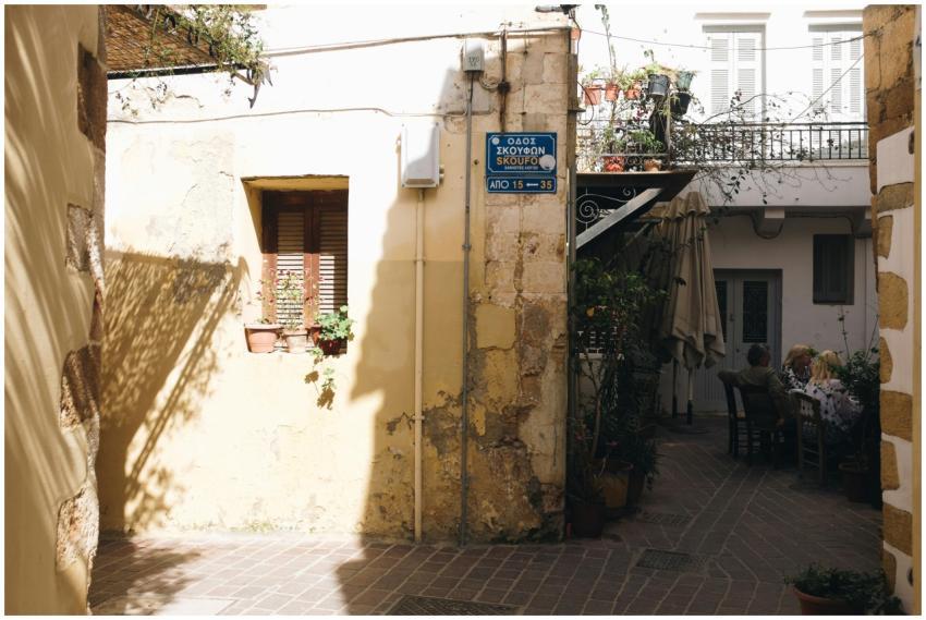 Cozy Mediterranean alley in Chania with rustic arc