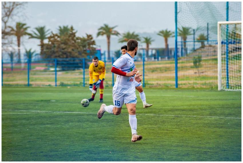 Dynamic soccer game with players in action on an o