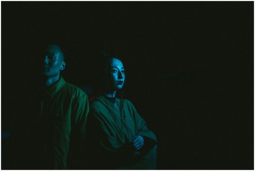 Dramatic portrait of a man and woman in traditiona