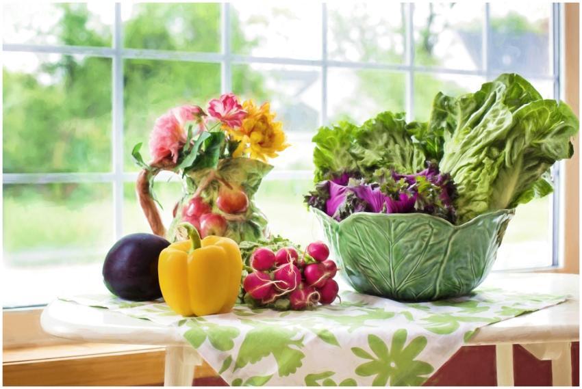 A vibrant display of fresh vegetables and flowers
