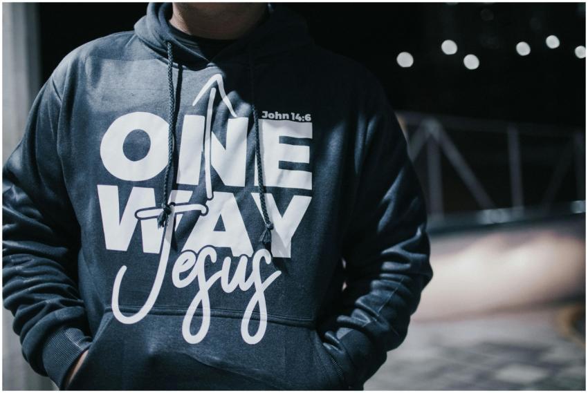 Close-up of a man in a hoodie with 'One Way Jesus'