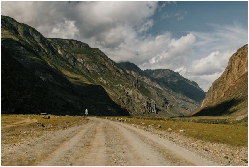 Explore a stunning mountain landscape with a dirt