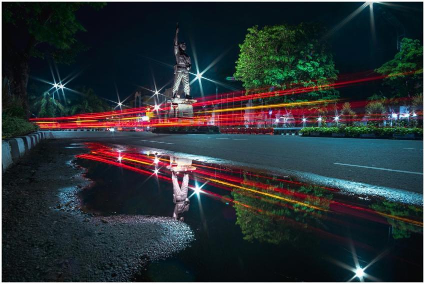 Dynamic night view of Surakarta's street with ligh