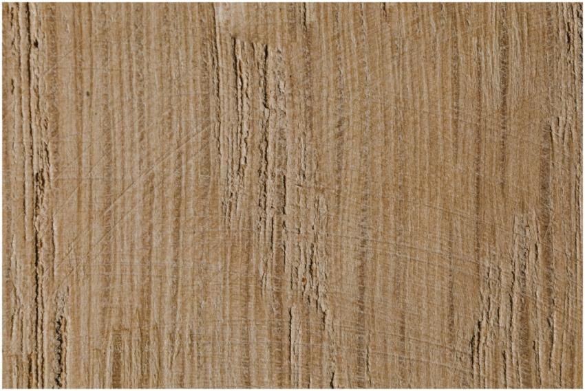 Close-up view of a textured wooden surface with na