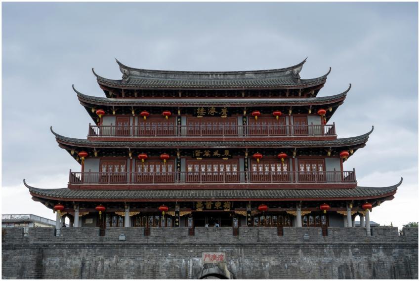 A classic Chinese pagoda adorned with red lanterns