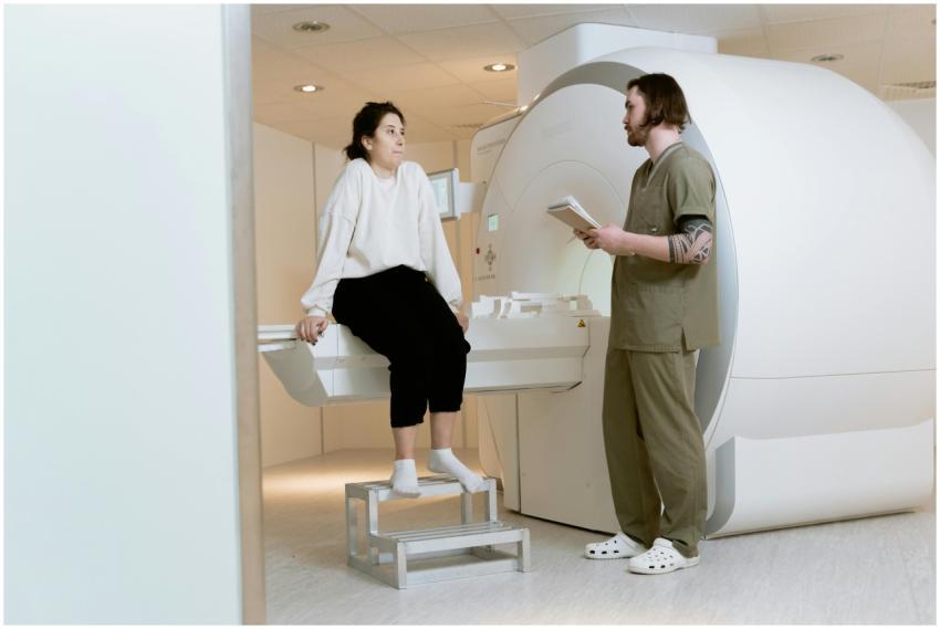 A patient consults with a technician in a modern M