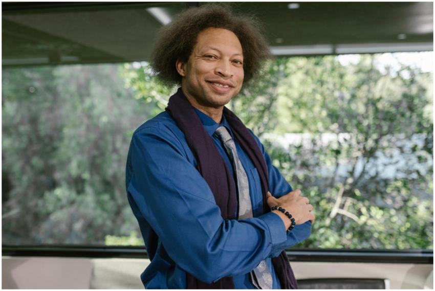 Smiling business professional posing confidently i