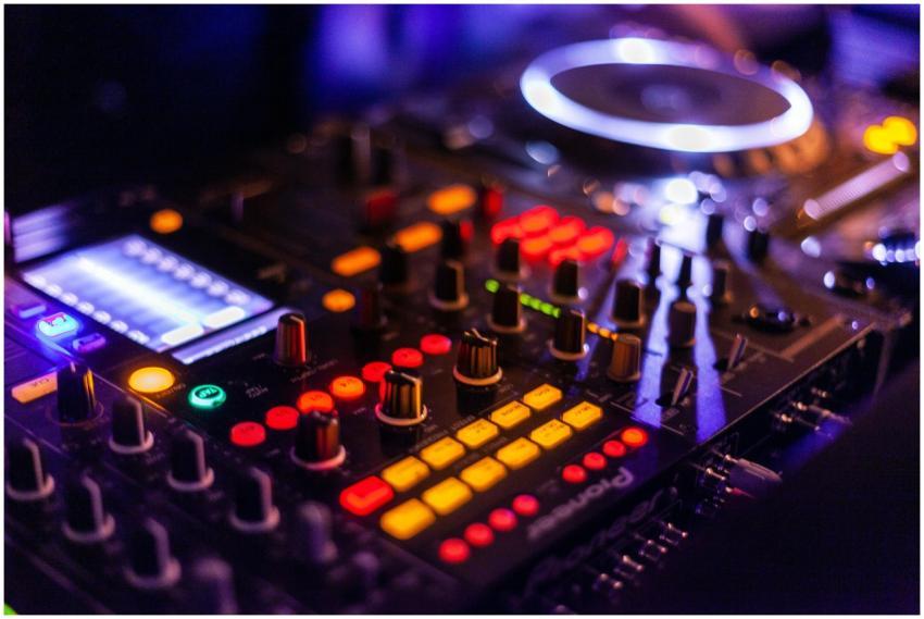 Vibrant DJ mixer with illuminated controls, perfec