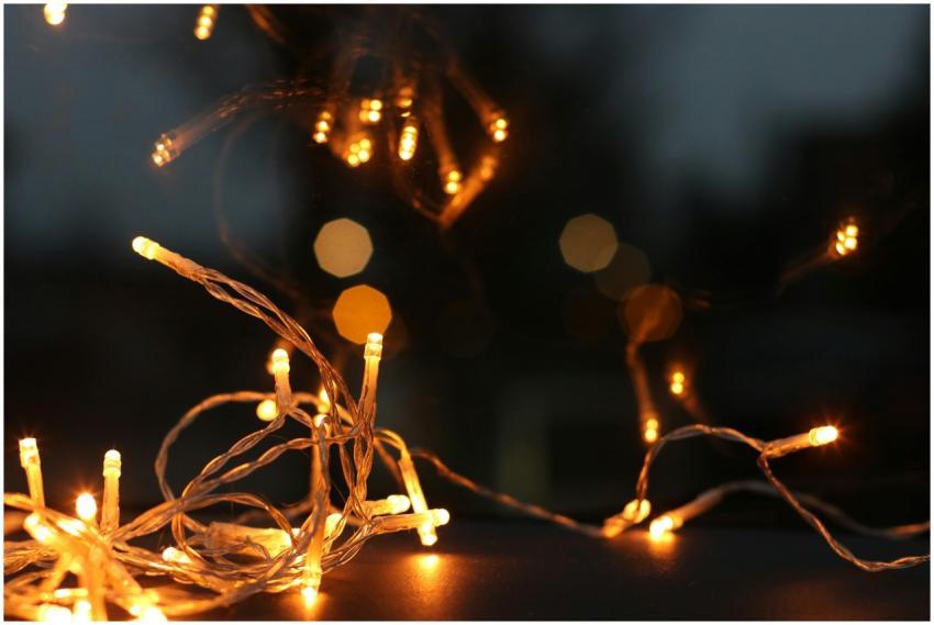 Close-up of glowing string lights creating a cozy