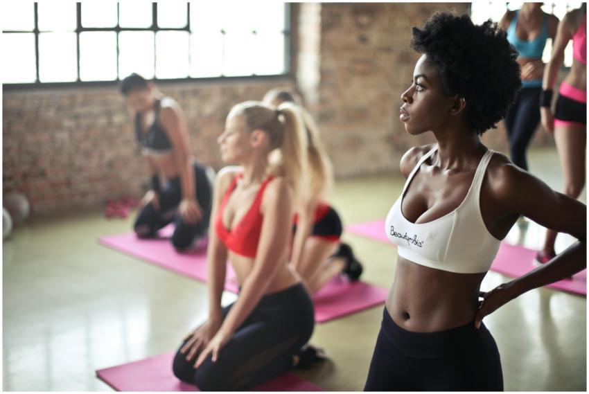Group of diverse women engaging in yoga session in