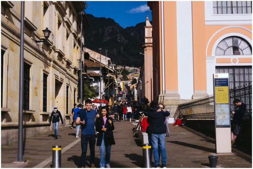 Lively street scene with people walking amidst his