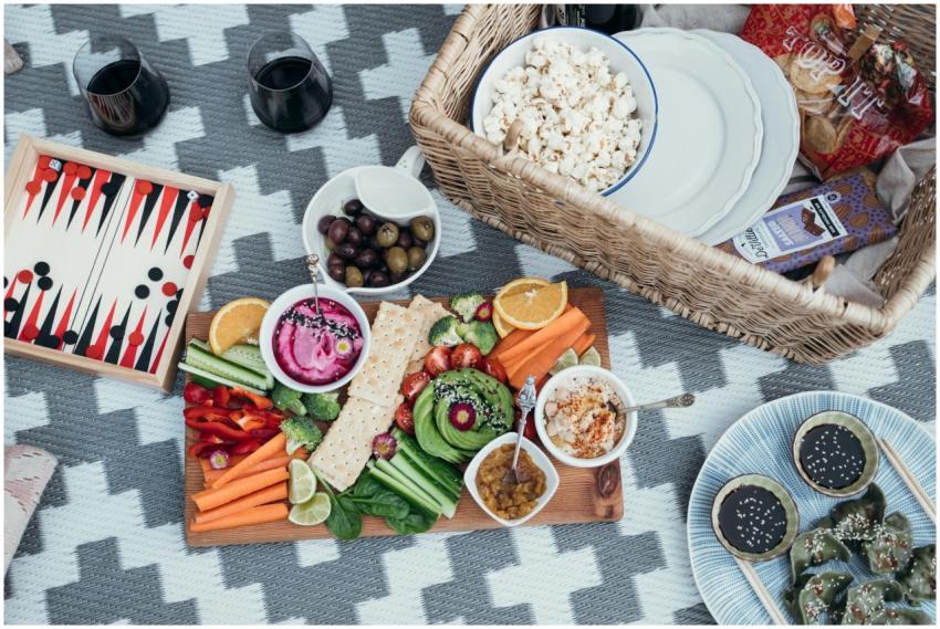 Colorful vegan picnic setup with variety of vegeta